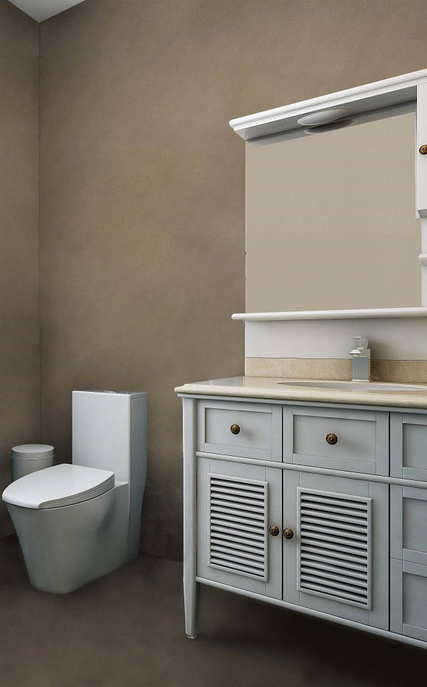 Baño con pared y suelo de microcemento en color topo