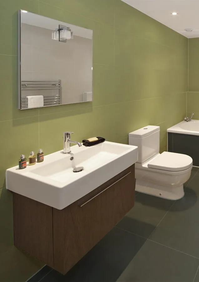 Baño con baldosas verdes