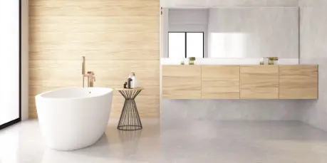 Baño con pared y suelo de microcemento gris