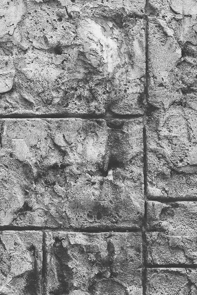 Diseño rústico de hormigón impreso vertical de adoquines grises