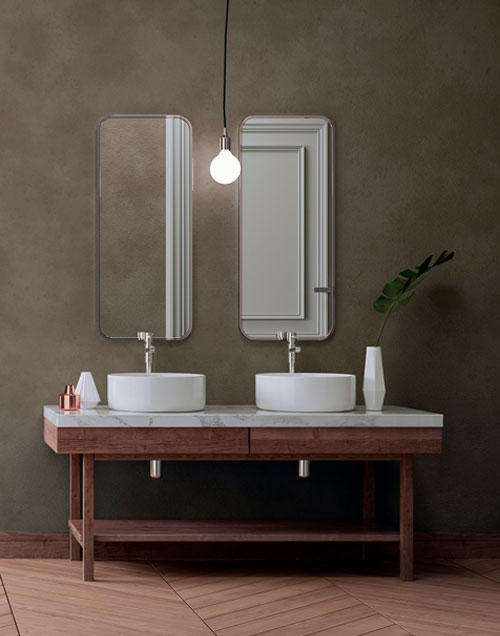 baño con microcemento y mueble de madera