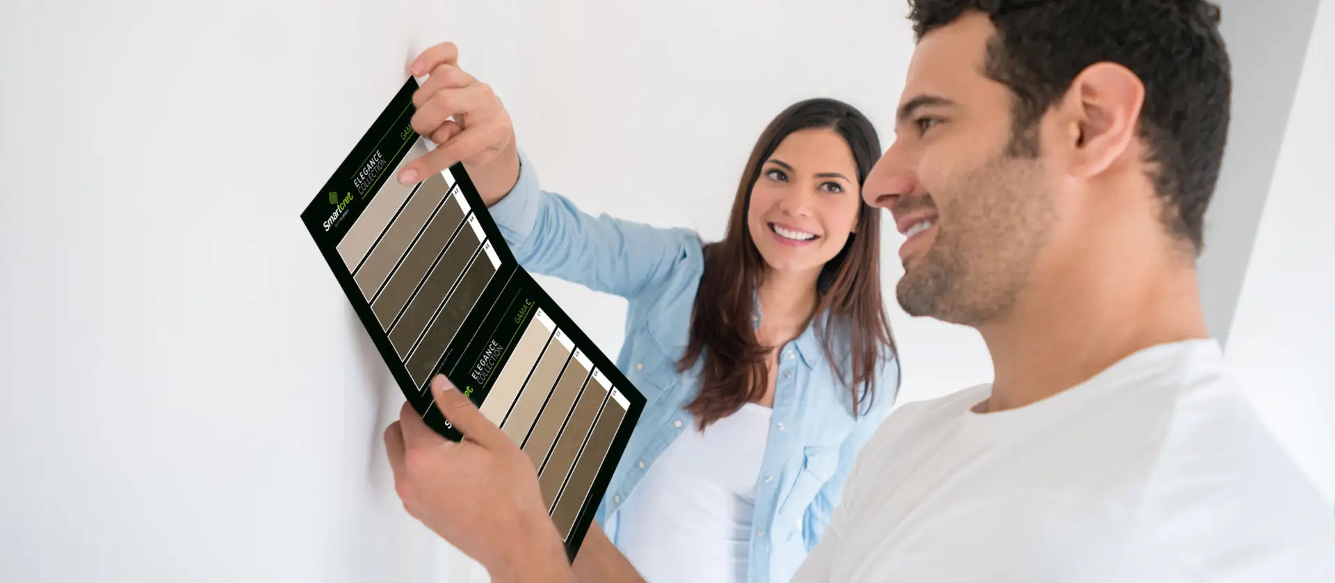 Man looking at Smartcret's ready-to-use microcement colors